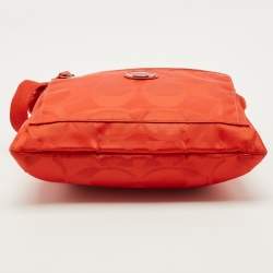 مملوكة مسبقًا حقيبة مراسلة نايلون توقيع كوتش برتقالي