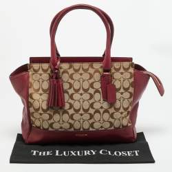مملوكة مسبقًا حقيبة يد كوتش جلد وقماش شهيرة بيج/وردي بشرابة ليجاسي