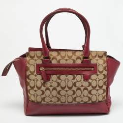 مملوكة مسبقًا حقيبة يد كوتش جلد وقماش شهيرة بيج/وردي بشرابة ليجاسي