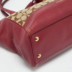 مملوكة مسبقًا حقيبة يد كوتش جلد وقماش شهيرة بيج/وردي بشرابة ليجاسي