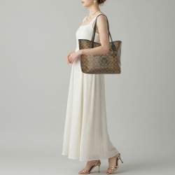 Pre Owned Coach Variety City Beige Signature Coated Canvas Shopper Tote