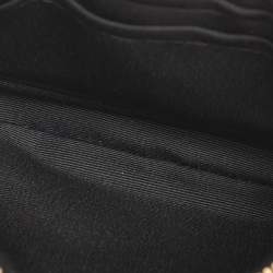 Pre Owned حقيبة كوتش حمالة معصم جلد لامع بصمة الشعار أسود