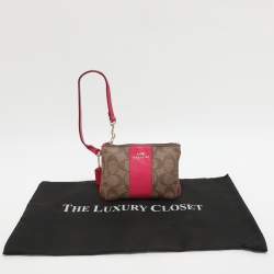 Pre Owned حقيبة يد كوتش جلد وكانفاس مقوى وردي بيج بحمالة معصم