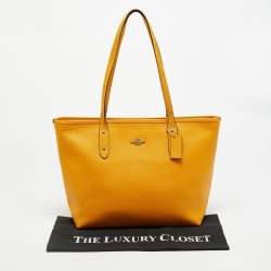 Pre Owned Coach City Yellow Leather Zip Shopper Tote