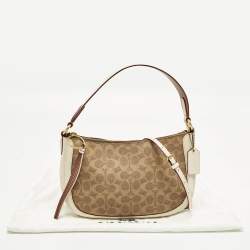 Pre Owned Coach Sutton Off White/Brown Signature Coated Canvas and Leather Crossbody Bag
