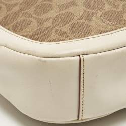 Pre Owned Coach Sutton Off White/Brown Signature Coated Canvas and Leather Crossbody Bag