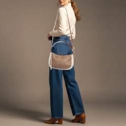 Pre Owned Coach Sutton Off White/Brown Signature Coated Canvas and Leather Crossbody Bag