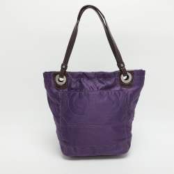مملوكة مسبقًا حقيبة يد توتس ساتان بنفسجي كوتش