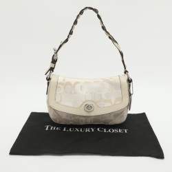 Pre Owned حقيبة كتف كوتش كانفاس مطبوع شعار الماركة بيج/كريمي وجلد