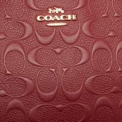 Pre Owned حقيبة صغيرة كوتش نوليتا جلد محفور بتوقيع باللون الأحمر