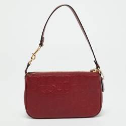 Pre Owned حقيبة صغيرة كوتش نوليتا جلد محفور بتوقيع باللون الأحمر