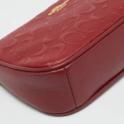 Pre Owned حقيبة صغيرة كوتش نوليتا جلد محفور بتوقيع باللون الأحمر