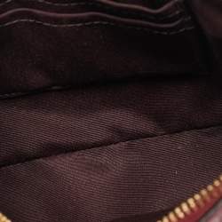 Pre Owned حقيبة صغيرة كوتش نوليتا جلد محفور بتوقيع باللون الأحمر