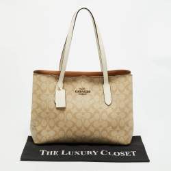 Pre Owned Coach Avenue Beige/White Signature Coated Canvas Tote