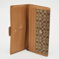 Pre Owned Coach Buckle Detail Beige/Tan Signature Canvas and Leather Continental Wallet