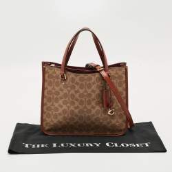 Pre Owned Coach Tyler Carryall Beige/Brown Signature Embossed Leather Tote