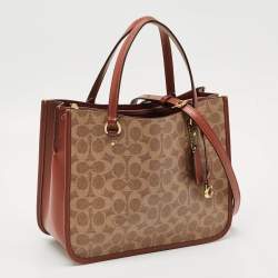Pre Owned Coach Tyler Carryall Beige/Brown Signature Embossed Leather Tote