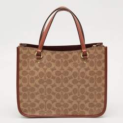 Pre Owned Coach Tyler Carryall Beige/Brown Signature Embossed Leather Tote