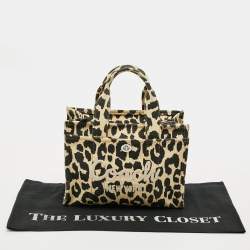 مملوكة مسبقًا حقيبة يد كوتش قماش بطباعة النمر الأسود / الأصفر الفاتح كارغو