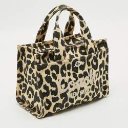 مملوكة مسبقًا حقيبة يد كوتش قماش بطباعة النمر الأسود / الأصفر الفاتح كارغو