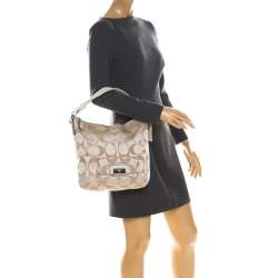 Pre Owned Coach Cream Canvas and Leather Small Kristin Hobo