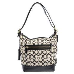 Pre Owned Coach Black/White Signature Canvas and Leather Tassel Hobo