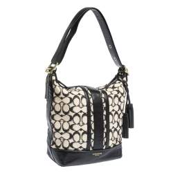 Pre Owned Coach Black/White Signature Canvas and Leather Tassel Hobo