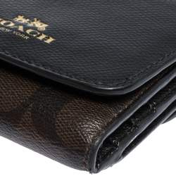 Pre Owned Coach Brown/Black Coated Canvas and Leather Trifold Wallet