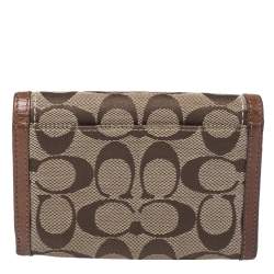 Pre Owned Coach Brown Signature Canvas and Leather Buckle Flap Compact Wallet