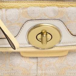 Pre Owned Coach Beige/Cream Signature Canvas and Leather Turnlock Pocket Wristlet Clutch