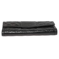 Pre Owned Coach Black Signature Embossed Leather Flap Wallet
