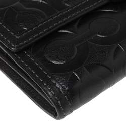 Pre Owned Coach Black Signature Embossed Leather Flap Wallet