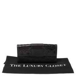 Pre Owned Coach Black Signature Embossed Leather Flap Wallet