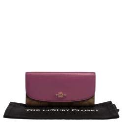 Pre Owned Coach Beige/Magenta Signature Coated Canvas and Leather Continental Wallet