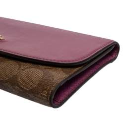 Pre Owned Coach Beige/Magenta Signature Coated Canvas and Leather Continental Wallet