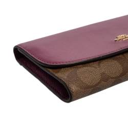 Pre Owned Coach Beige/Magenta Signature Coated Canvas and Leather Continental Wallet