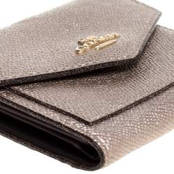 Pre Owned Coach Metallic Rose Gold Leather Colorblock Trifold Wallet 