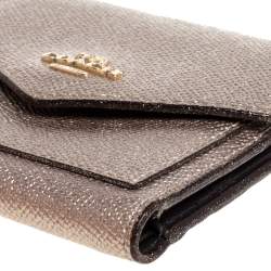 Pre Owned Coach Metallic Rose Gold Leather Colorblock Trifold Wallet 