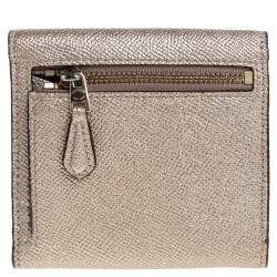 Pre Owned Coach Metallic Rose Gold Leather Colorblock Trifold Wallet 