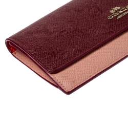 Pre Owned Coach Peach/Maroon Leather Flap Continental Wallet 