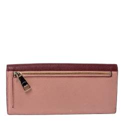 Pre Owned Coach Peach/Maroon Leather Flap Continental Wallet 