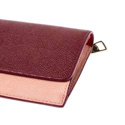 Pre Owned Coach Peach/Maroon Leather Flap Continental Wallet 