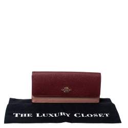 Pre Owned Coach Peach/Maroon Leather Flap Continental Wallet 