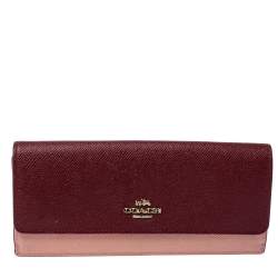 Pre Owned Coach Peach/Maroon Leather Flap Continental Wallet 