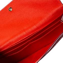 Pre Owned Coach Peach/Maroon Leather Flap Continental Wallet 