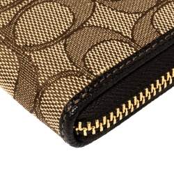 Pre Owned Coach Beige/Brown Signature Canvas and Leather Zip Around Wallet