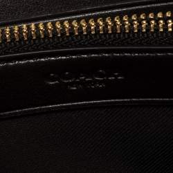 Pre Owned Coach Beige/Brown Signature Canvas and Leather Zip Around Wallet