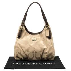 Pre Owned Coach Beige/Brown Signature Canvas and Leather Madison Maggie Hobo