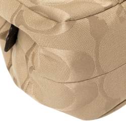 Pre Owned Coach Beige/Brown Signature Canvas and Leather Madison Maggie Hobo