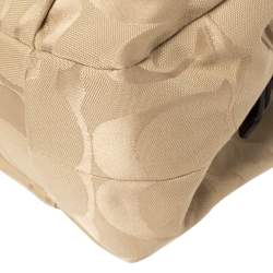 Pre Owned Coach Beige/Brown Signature Canvas and Leather Madison Maggie Hobo